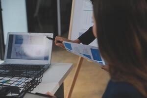 Close up ux developer and ui designer use augmented reality brainstorming about mobile app interface wireframe design on desk at modern office.Creative digital development agency photo