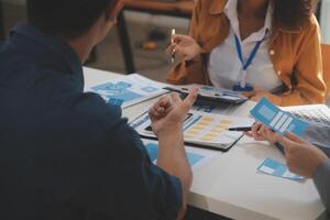 Close up ux developer and ui designer use augmented reality brainstorming about mobile app interface wireframe design on desk at modern office.Creative digital development agency photo
