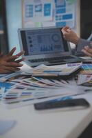 Close up ux developer and ui designer use augmented reality brainstorming about mobile app interface wireframe design on desk at modern office.Creative digital development agency photo