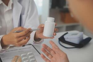 Healthcare service and pharmacy worker with customer at store counter for medication explanation. Pharmaceutical advice and opinion of pharmacist helping girl with medicine information. photo