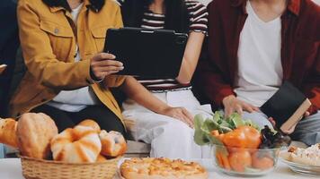 Lunch, happy friends and pizza party with food, drinks and conversation, social gathering and get together. Young people, group and happiness at fast food pizzeria, restaurant and celebration at home video