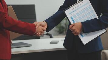 Business handshake for teamwork of business merger and acquisition,successful negotiate,hand shake,two businessman shake hand with partner to celebration partnership and business deal concept video