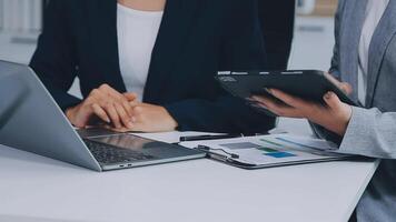 Business team project manager working and update tasks with milestones progress planning and professional investor working new start up project in the office. video