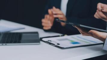 Business team project manager working and update tasks with milestones progress planning and professional investor working new start up project in the office. video