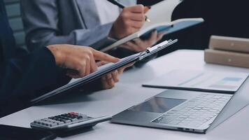 Business team project manager working and update tasks with milestones progress planning and professional investor working new start up project in the office. video