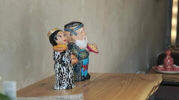 Uzbek national ceramic figurines at the hotel counter video