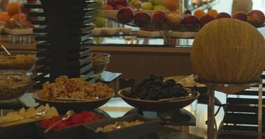 Buffet table in the dining room of an expensive luxury hotel video