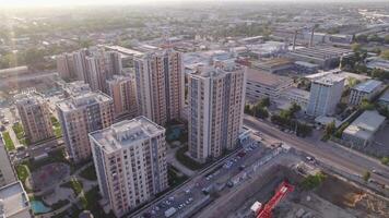 A drone flies over newly built high-rise buildings video