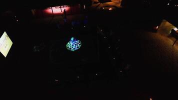 A drone takes pictures of a spinning dancer wearing an Arabic cape video