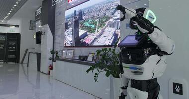 Tashkent, Uzbekistan - 8 4 2022. Humanoid robot at the exhibition in the showroom video