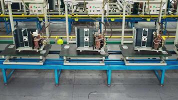 Drone over automated conveyor belt in the workshop of a large factory video