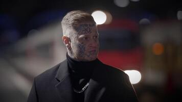 Unconventional Young Man Covered in Tattoos and Dark Black Clothes video