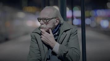 Elderly Homeless Man Suffering from Poverty Looking for Help at Train Station video