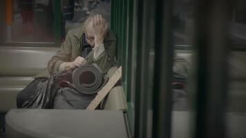 Elderly Homeless Man Suffering from Poverty Looking for Help at Train Station video