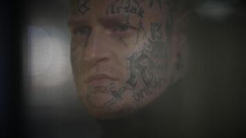 Unconventional Young Man Covered in Tattoos and Dark Black Clothes video