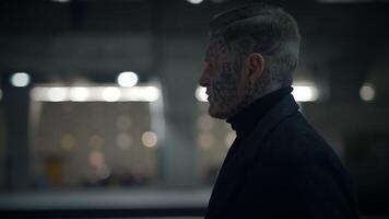 Intimidating Maverick Rebel Man with Head and Face Tattoos in Provoking Style video