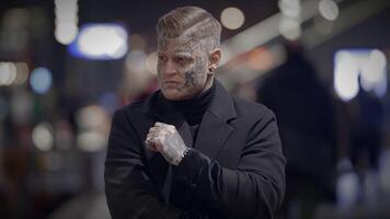 Unconventional Young Man Covered in Tattoos and Dark Black Clothes video