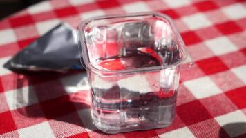 water in a plastic container on a table video