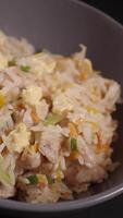 hot fried rice in a bowl on table video