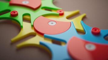 Looping 3D animation multi-colored plastic toy gears. video