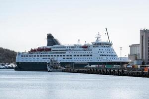 Cruise ship anchored at harbor photo