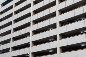 Parking lot on aged building photo