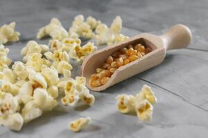 Popcorn on a wooden background photo