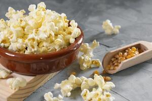 Popcorn on a wooden background photo