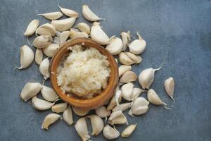 top view of  minced garlic in a container photo