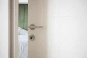 open door concept with Door handle and blur interior room background, photo