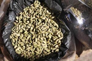 top view of Cardamom in a large box selling at local store photo