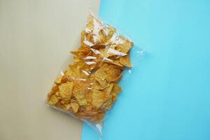 top view of potato chips packet on a table photo