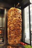 rotating traditional gyros meat close up photo