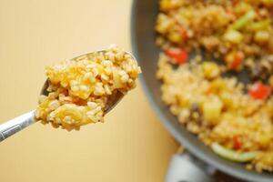 bulgur rice on a spoon photo