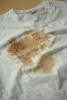 spilled coffee on a white shirt photo