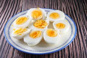 close up of bowel egg in a bowl on table photo