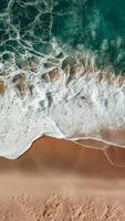 ai generado agua espuma con suave arena olas en tropical playa foto vertical móvil fondo de pantalla