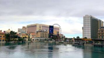 Las Vegas, Nevada, USA - 08 Apr 2024 Tranquil Waters by the Las Vegas Strip, Calm waters in front of iconic Las Vegas Strip landmarks create a serene urban oasis. video