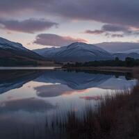 AI generated Dawn skies reflect in tranquil waters of Loch Dunvegan For Social Media Post Size photo