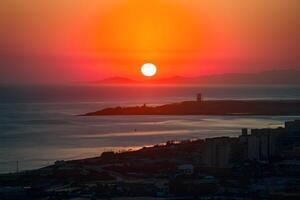 AI generated Sunrise illuminates Aqaba Gulf from stunning Eilat vantage point photo