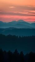 ai generado montañas silueta en contra puesta de sol crear asombroso escénico ver vertical móvil fondo de pantalla foto