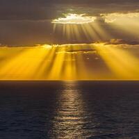 AI generated Dramatic sunset over North Sea bathed in golden sunbeams For Social Media Post Size photo