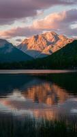 ai generado pintoresco puesta de sol escena se baña el lago en cálido, dorado matices vertical móvil fondo de pantalla foto