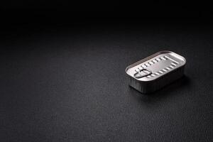 Rectangular can of fish in oil with salt and spices photo