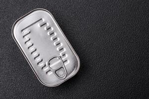 Rectangular can of fish in oil with salt and spices photo