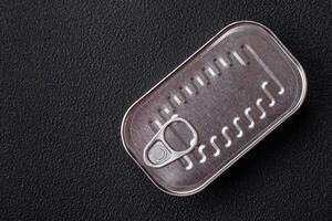 Rectangular can of fish in oil with salt and spices photo