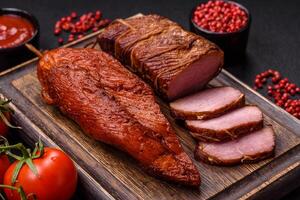 Delicious smoked meat pork or chicken with salt, spices and herbs photo