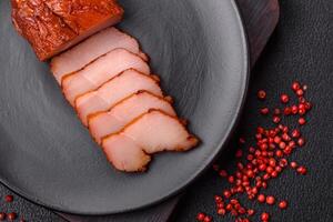 Delicious smoked meat chicken breast with salt, spices and herbs photo