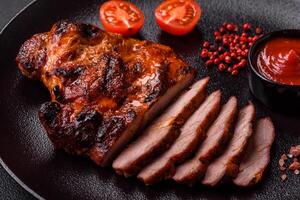 Fresh juicy delicious beef steak on a dark background photo