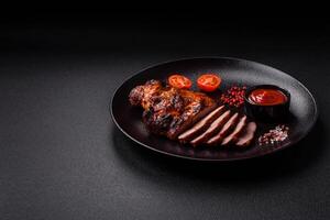 Fresh juicy delicious beef steak on a dark background photo